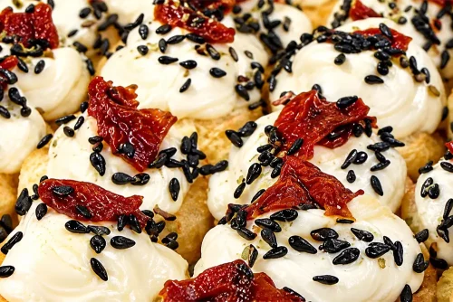 Canapés de tomate seco (moda boracéia)